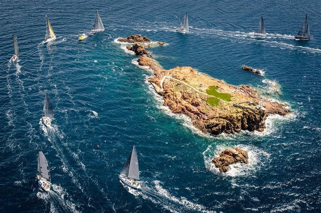 Fleet rounding Le Lion de Mer during the second offshore race - Giraglia Rolex Cup 2012 &copy;  Rolex/ Kurt Arrigo http://www.regattanews.com